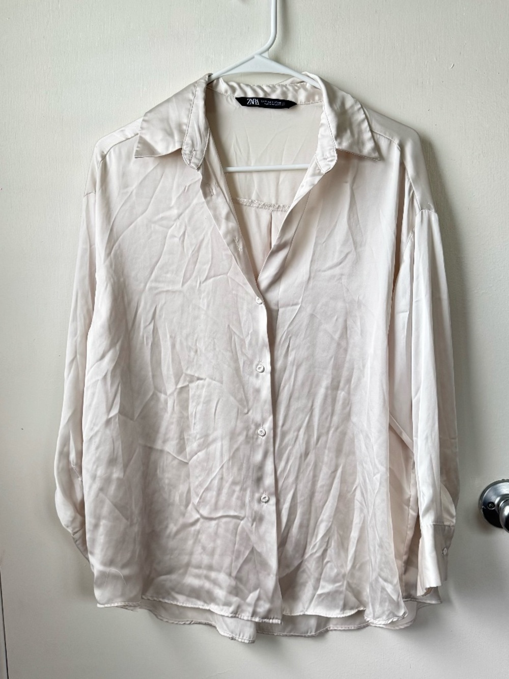 Small white Zara long sleeve silk top